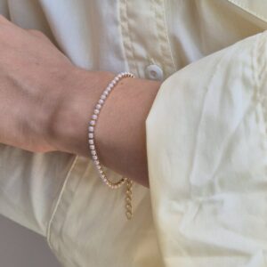 Pulseira dourada riviera com pérolas